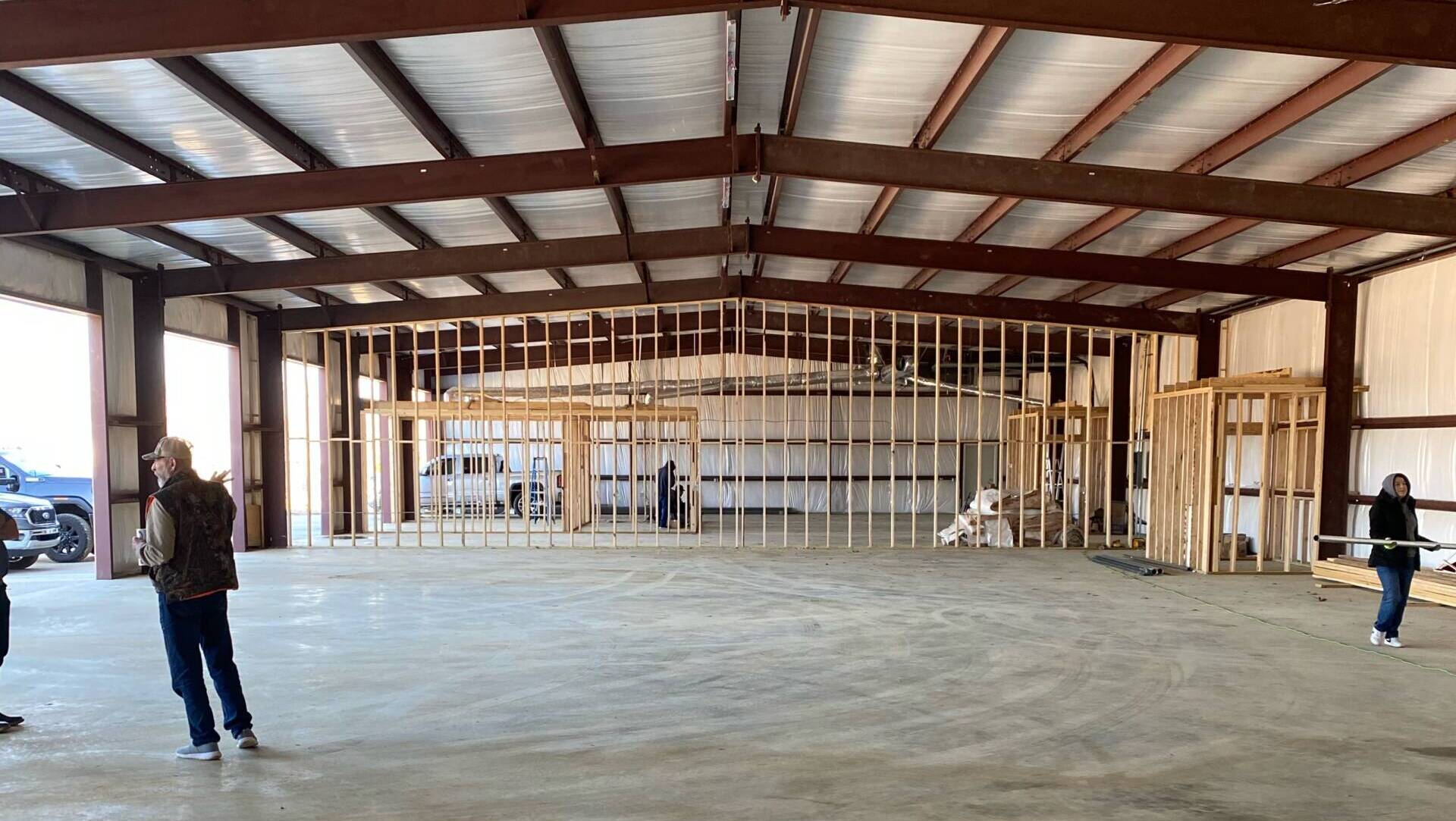 A large room with many windows and walls.