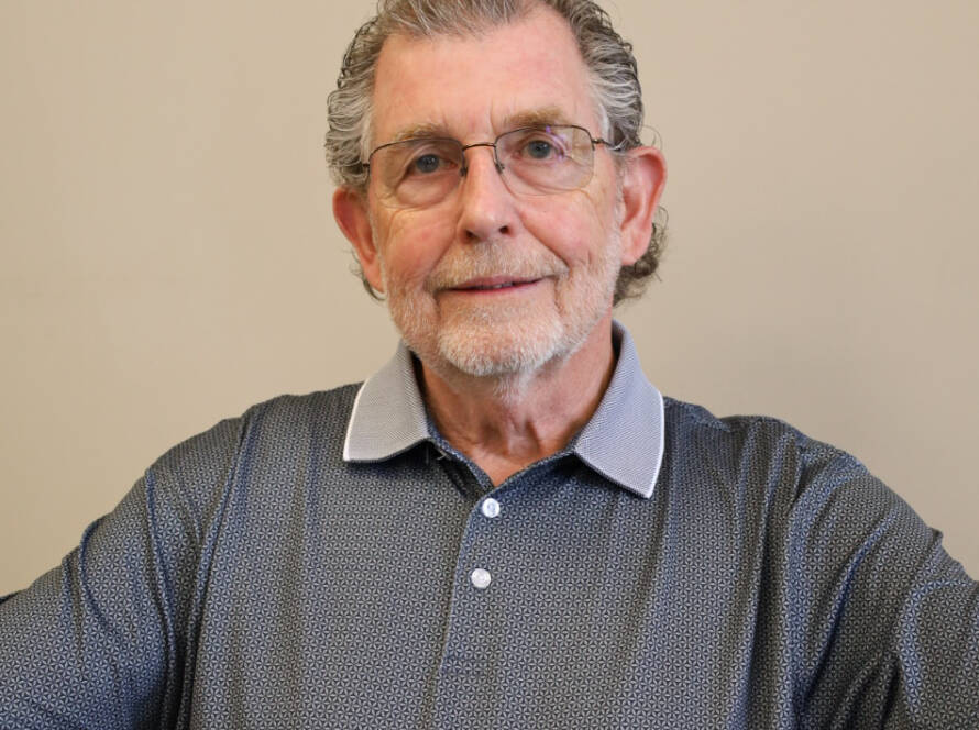 Senior man wearing glasses in polo shirt